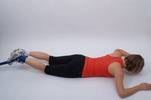 Beinbeugen mit dem Expander